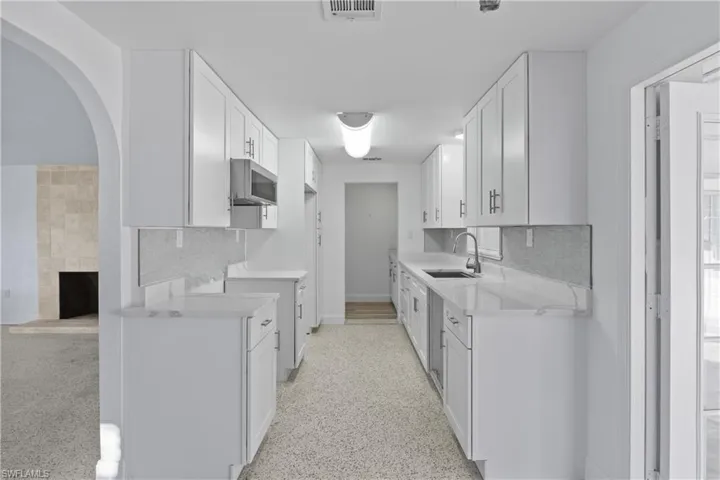 Well-appointed kitchen with ample workspace and an easy flow for everyday living and entertaining.