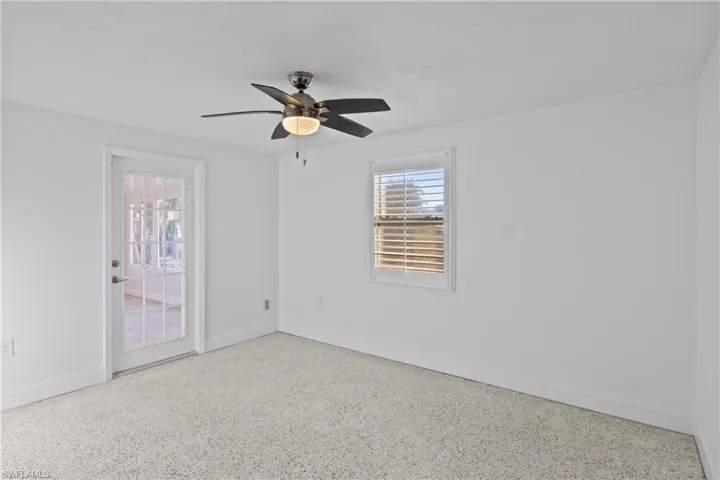 Versatile third bedroom that can serve as an office, den, or additional sleeping space.