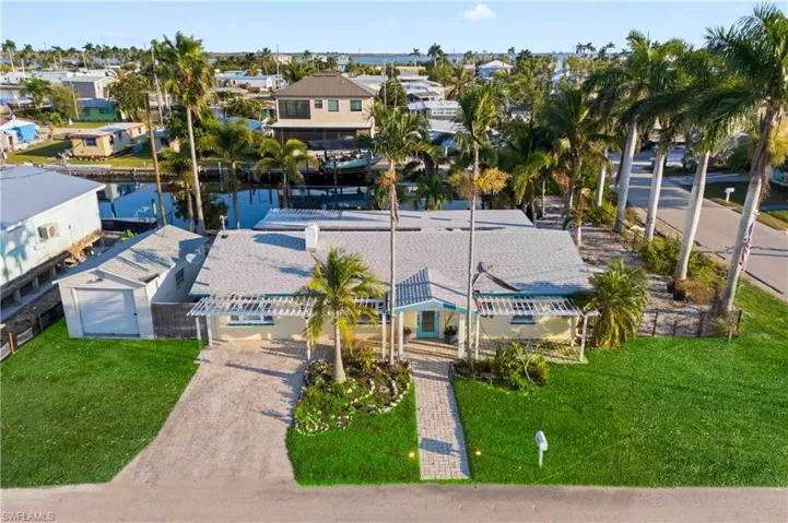 Eye-catching Old-Florida style exterior in a vibrant waterfront community.