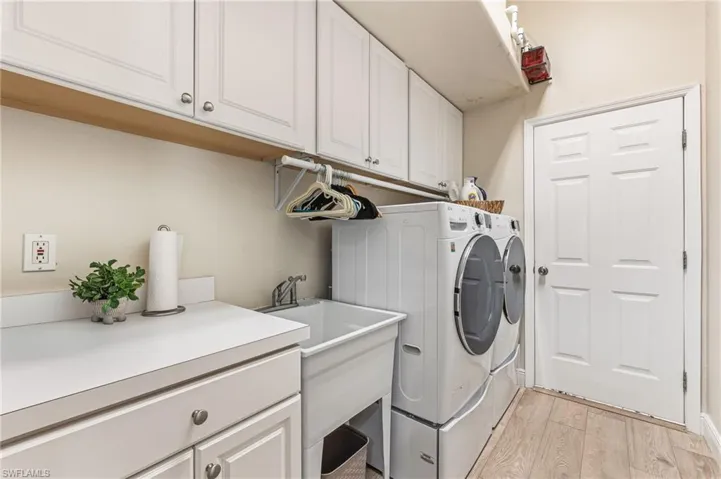 Laundry Room with Built-In Cabinets