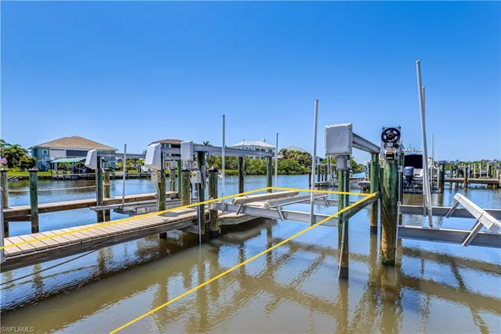 Boater's dream: private dock and boat lift included.