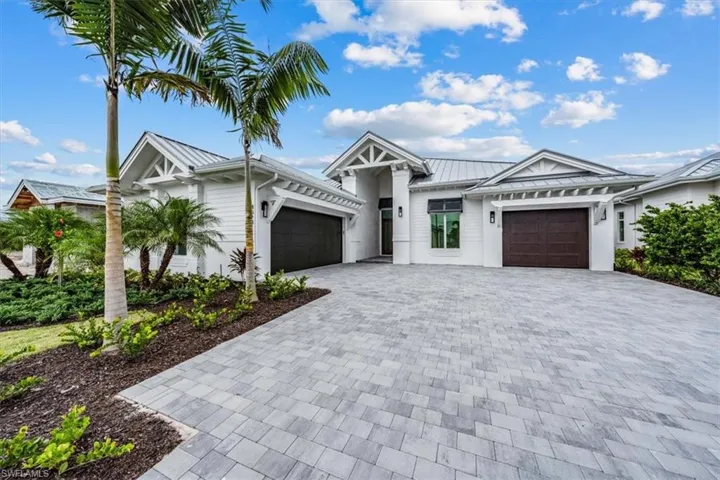 4529 Seagrove Landing Way (the Beach plan) is a Pending pre-construction sale. This is a photo of the Beach on Lot 9 (4518 Seagrove Landing Way - available & move-in ready).