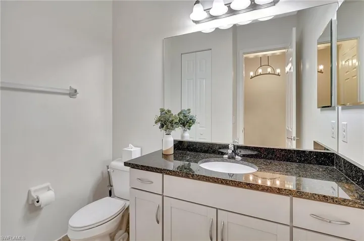 Bathroom featuring toilet and vanity