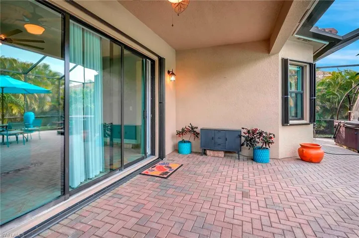 View of patio with glass enclosure