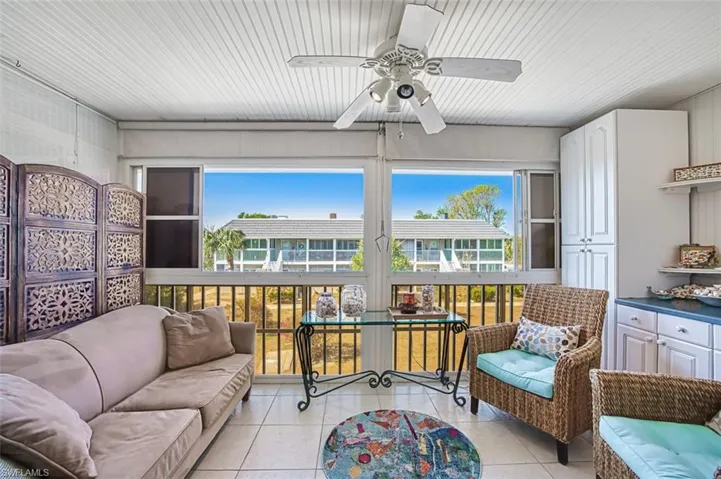 Enclosed lanai for extending living with built in cabinets for storage