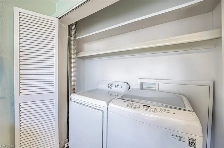 Full size washer and dryer and shelve space