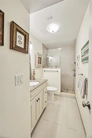 Recently updated primary bathroom with walk-in shower