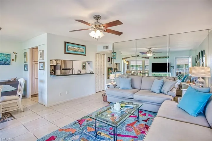 Bright living space with 18-inch tile throughout