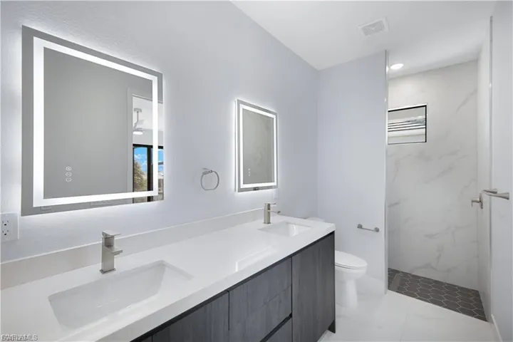 Master Bath with double sink in finished home