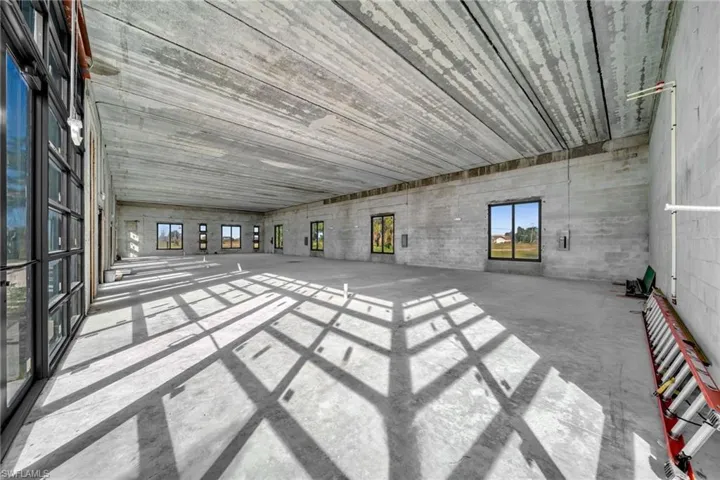Miscellaneous room featuring concrete floors
