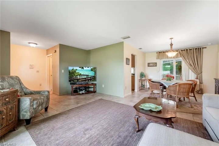 Tiled living area with baseboards
