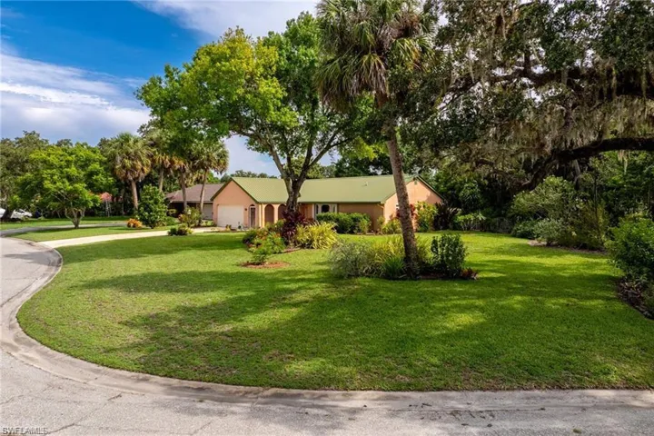 Ranch-style home with a front yard