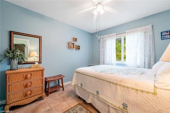 Bedroom featuring a ceiling fan
