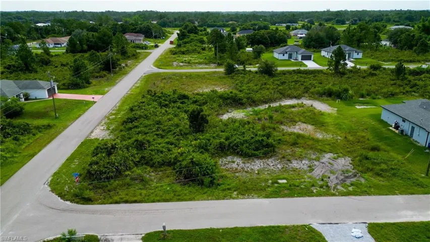 Cleared building lot with established road frontage on a paved street