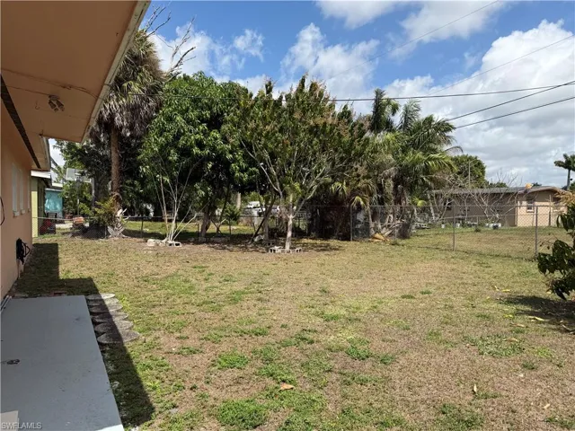 View of fenced backyard