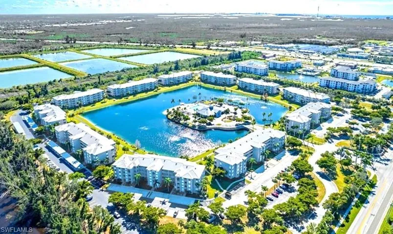 ENTRANCE GATE ON THE RIGHT.CLUBHOUSE, POOL, SPA, BEACH, GYM....ON THE ISLAND