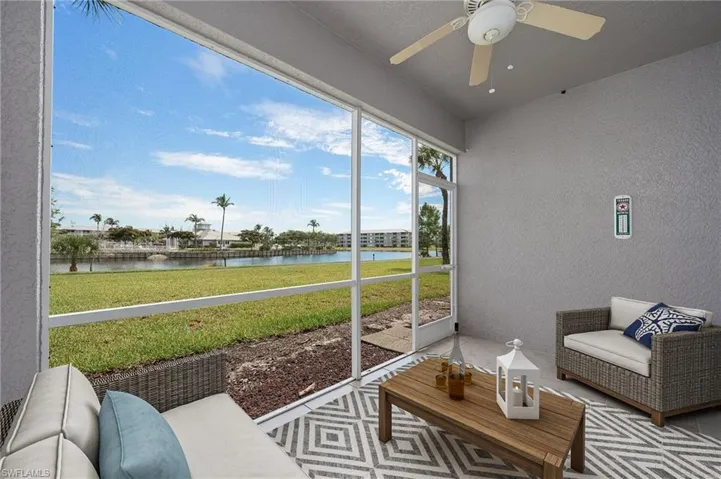 BACK, SCREENED LANAI WITH LAKEFRONT VIEWS. JUST STEPS OUTSIDE THE BACK DOOR TO THE WALKING TRAIL. WALK OVER TO THE POOL. HOT TUB, CLUBHOUSE, FISHING PIER, EXERCISE ROOM....