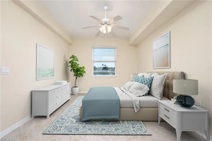 MAIN BEDROOM HAS LAKE VIEWS, DOUBLE CLOSETS AND LARGE BATHROOM WITH WALK-IN SHOWER.