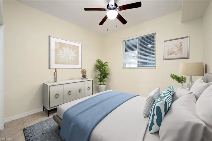 BEDROOM #2 / GUEST ROOM ON THE FRONT OF THE HOME - PHOTO IS STAGED