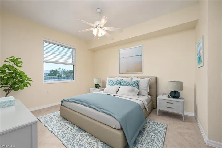 MAIN BEDROOM HAS LAKE VIEWS, DOUBLE CLOSETS AND LARGE BATHROOM WITH WALK-IN SHOWER.