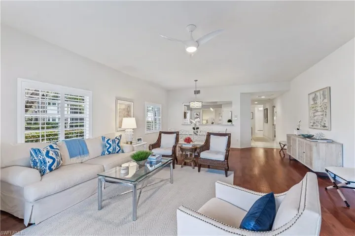 The living room with views to the kitchen & entrance