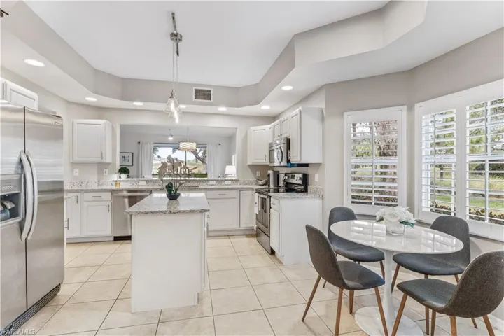 Large kitchen with breakfast room opening to living area