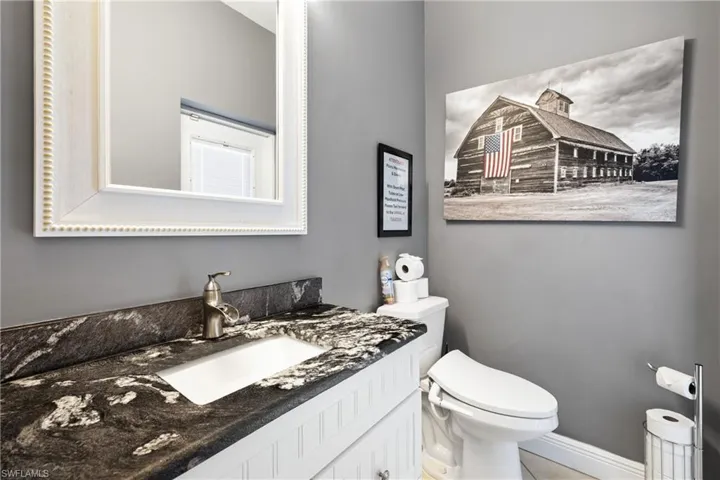Bathroom with vanity and toilet