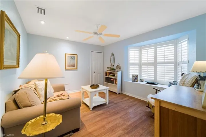 Office area featuring ceiling fan and hardwood / wood-style floors