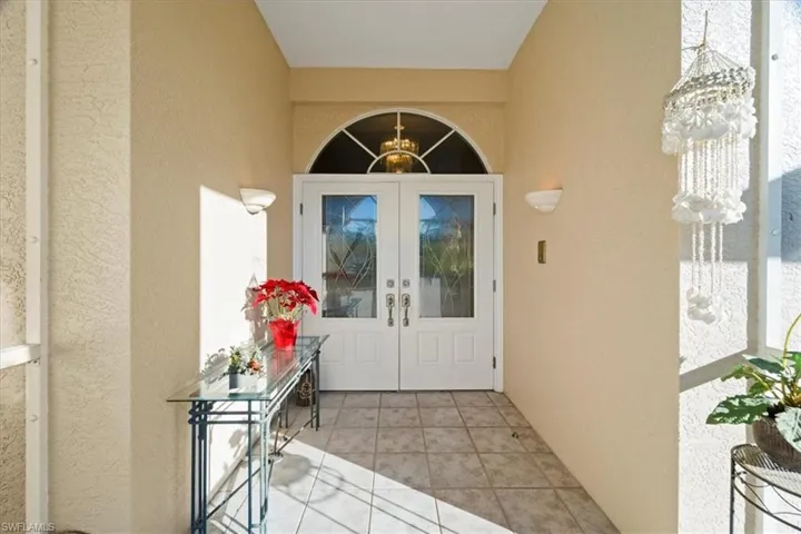 Doorway to property featuring french doors