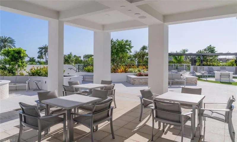 Covered terrace ideal for outdoor dining and social gatherings.