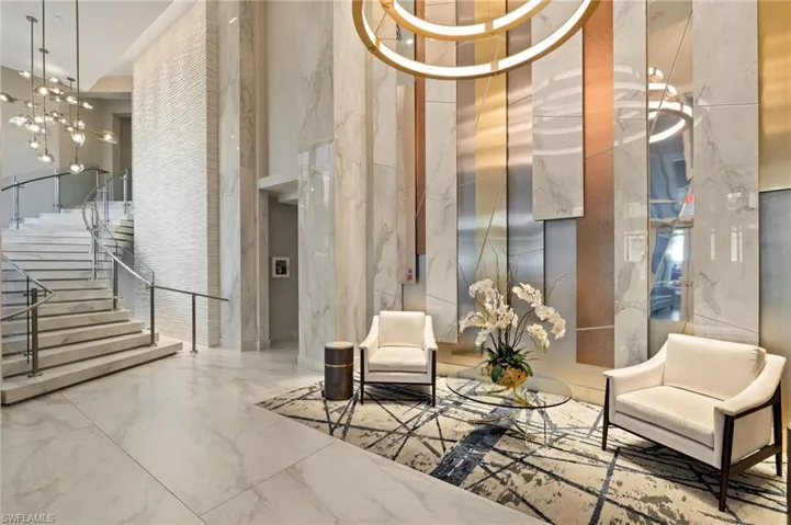 Stunning lobby with marble staircase