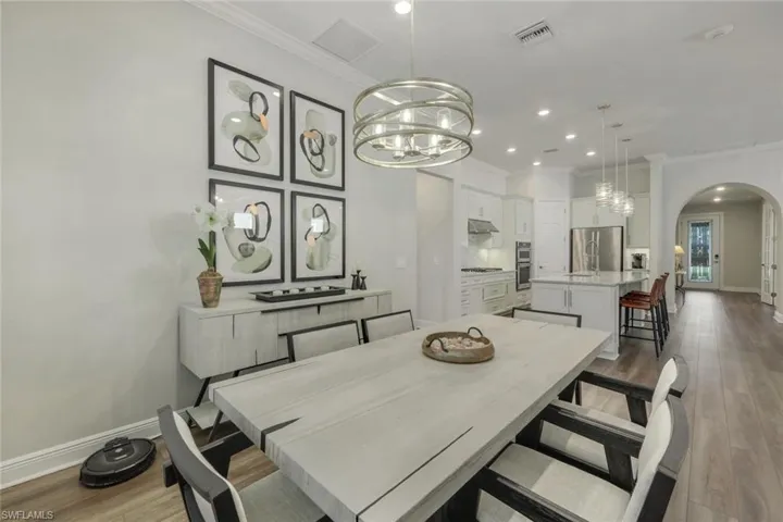 Dining area open to great room and kitchen