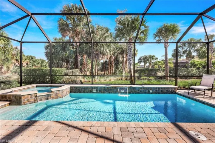 View of saltwater pool and spa