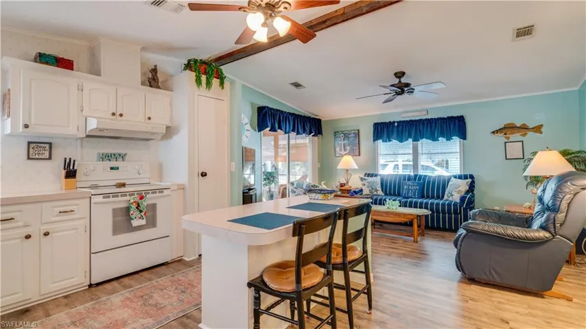 The Open Floor Plan, and vaulted ceiling, add warmth and comfort to the Great Room.