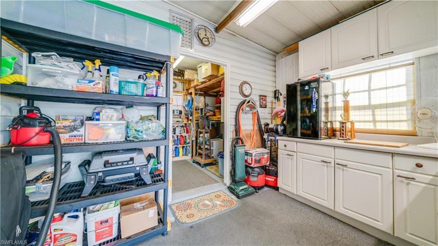Storage, storage, and more storage in this 9' x 12' storage area/workshop. Air conditioned, too.