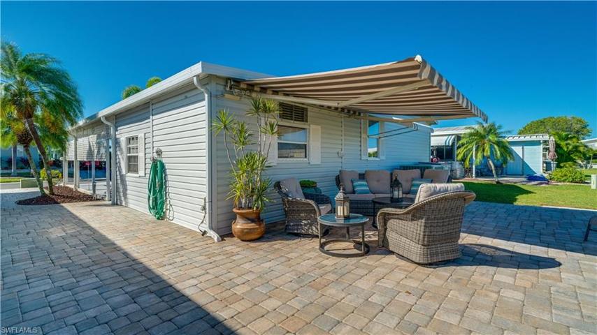Beautifully well maintained brick pavers add style and elegance to this lovely home. The view from this 483 SF patio must be seen to be appreciated.