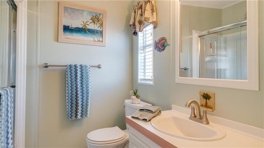 A stand alone shower and a line closet are offered in the master bath.