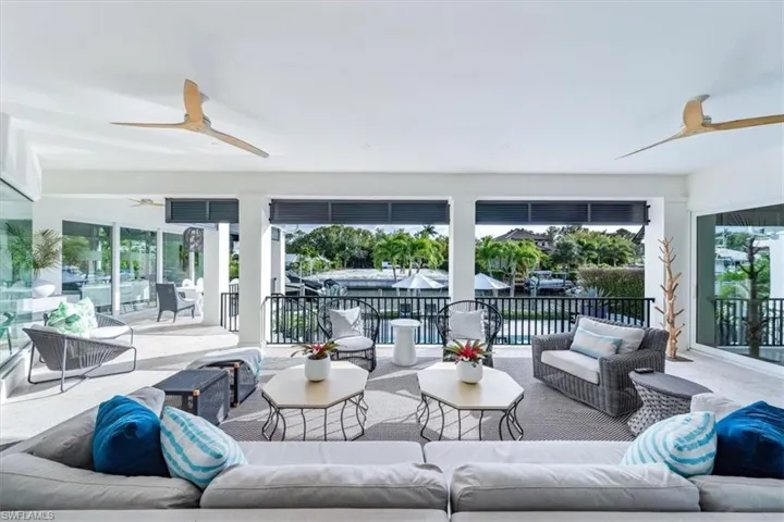 Outdoor covered lanai overlooking pool