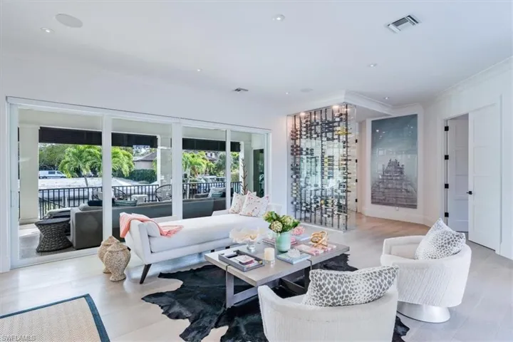 Great room with wall of sliders