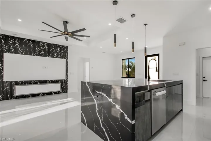 Kitchen featuring visible vents, recessed lighting, ceiling fan, a sink, and dishwasher