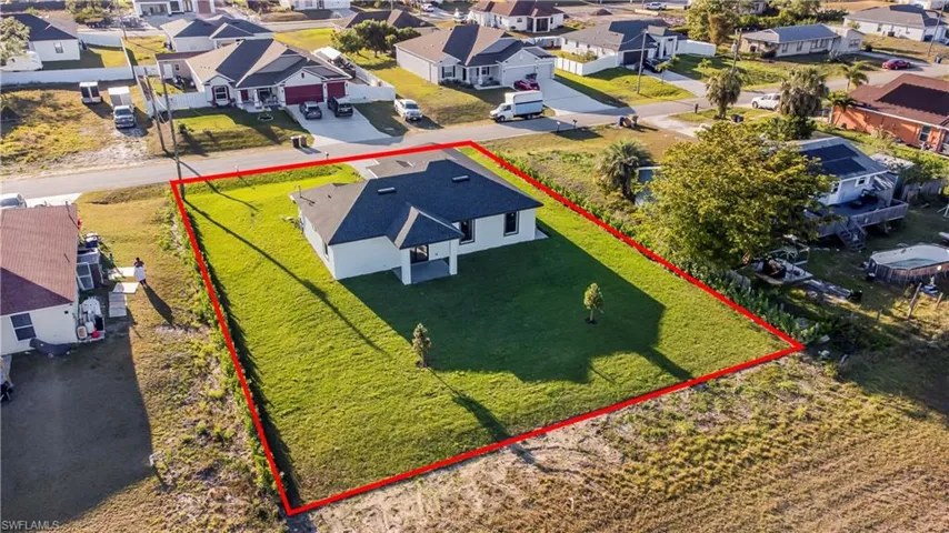 Birds eye view of property with a residential view