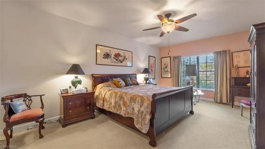 Bedroom with carpet and ceiling fan