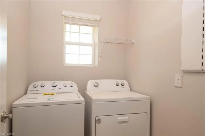 Laundry room featuring washer and dryer