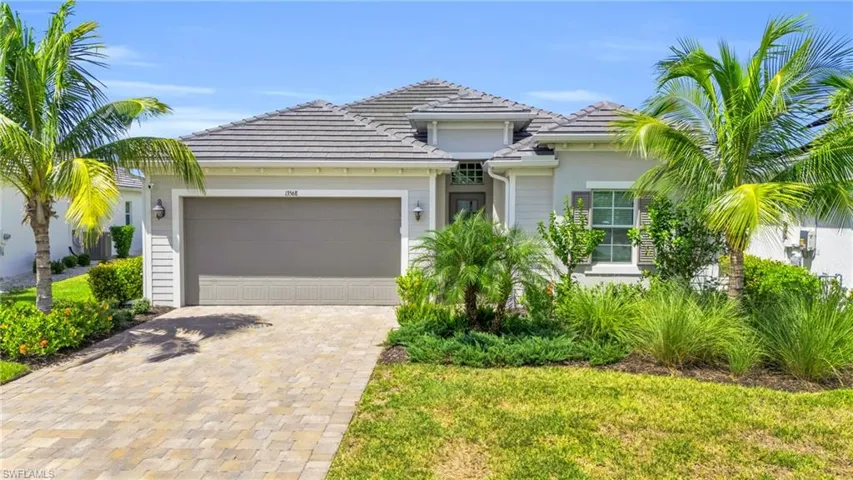 View of front of property with a garage
