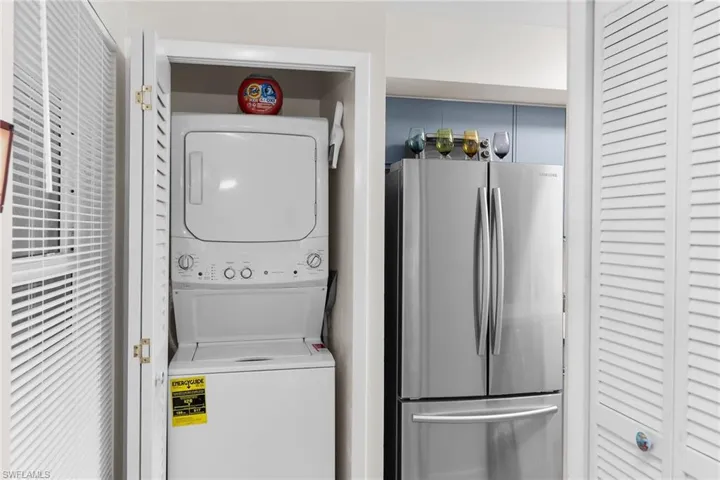 Laundry room with stacked washer / drying machine