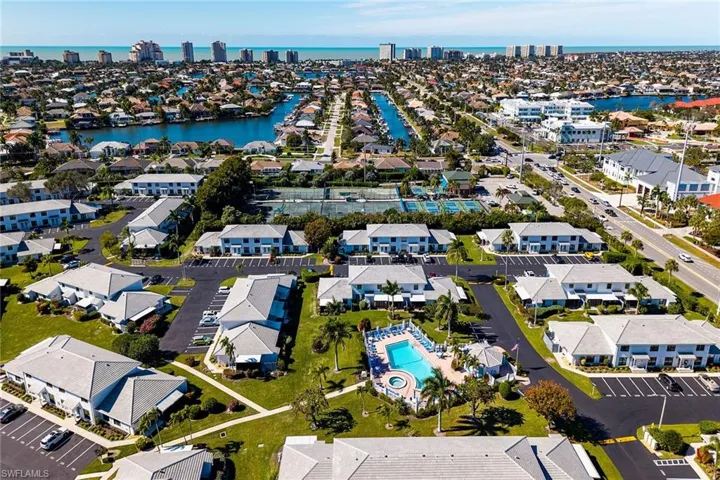 Aerial view of residential area with a nearby body of water