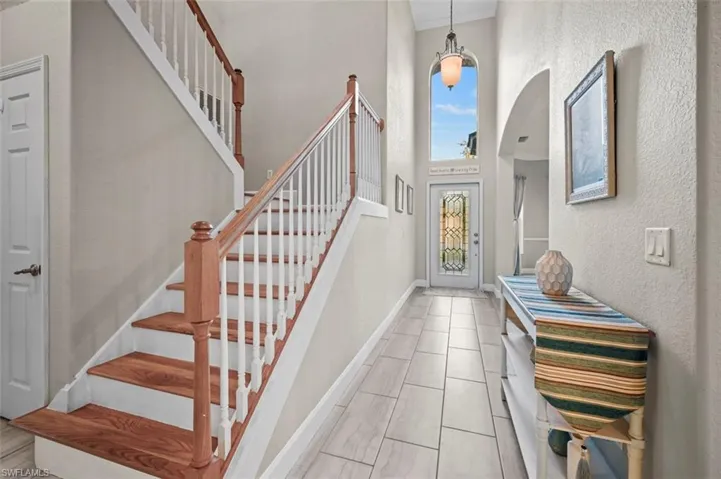 Entrance foyer with a towering ceiling