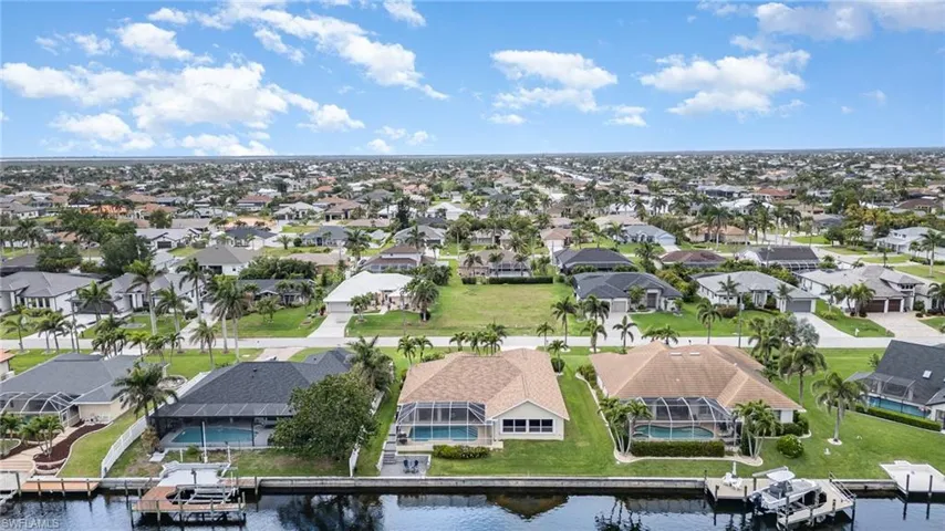 Aerial view with a residential view and a water view