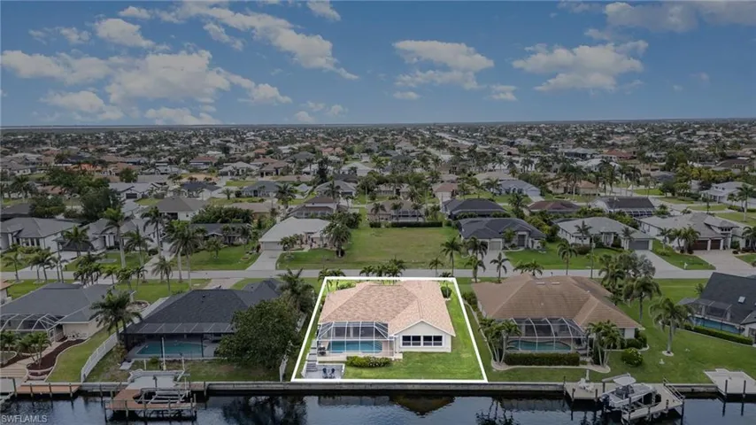 Bird's eye view featuring a water view and a residential view