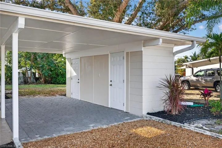 View of outbuilding with a carport